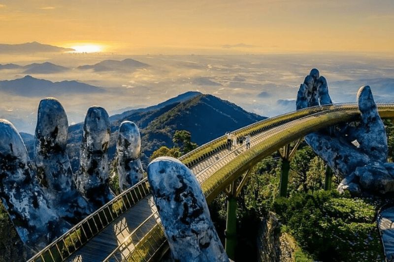 amanecer en da nang sobre el puente de oro - fuente ngoisao.vn
